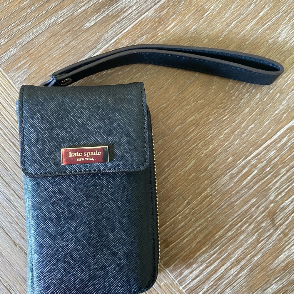 Kate Spade wristlet wallet with phone case.  New with tags.